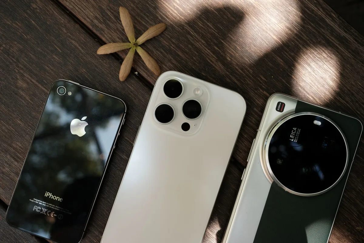 Close-up of iPhone settings menu showing camera format options with HEIF and HEVC toggles highlighted, clean interface design
