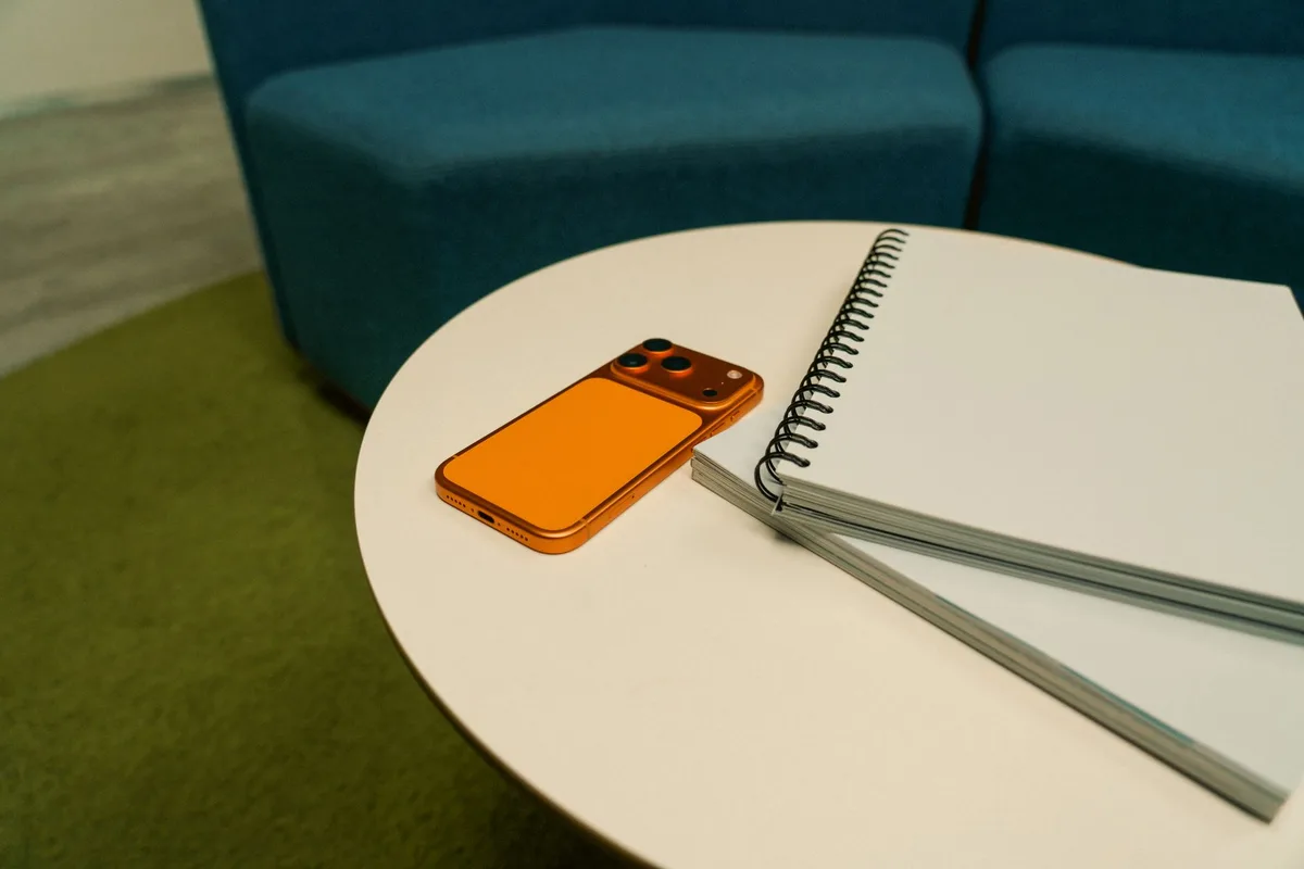 iPhone screen showing Notes app with Markup tools and signature option visible, document displayed for signing