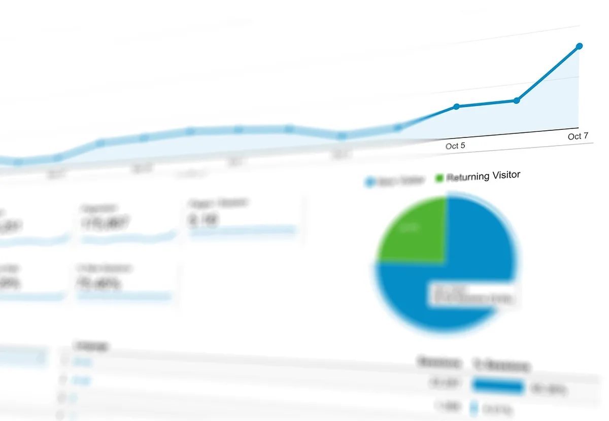 A glowing AI model interface displaying performance metrics and benchmarks, with multiple graphs showing upward trending lines, representing computational advancement and superiority in testing results.