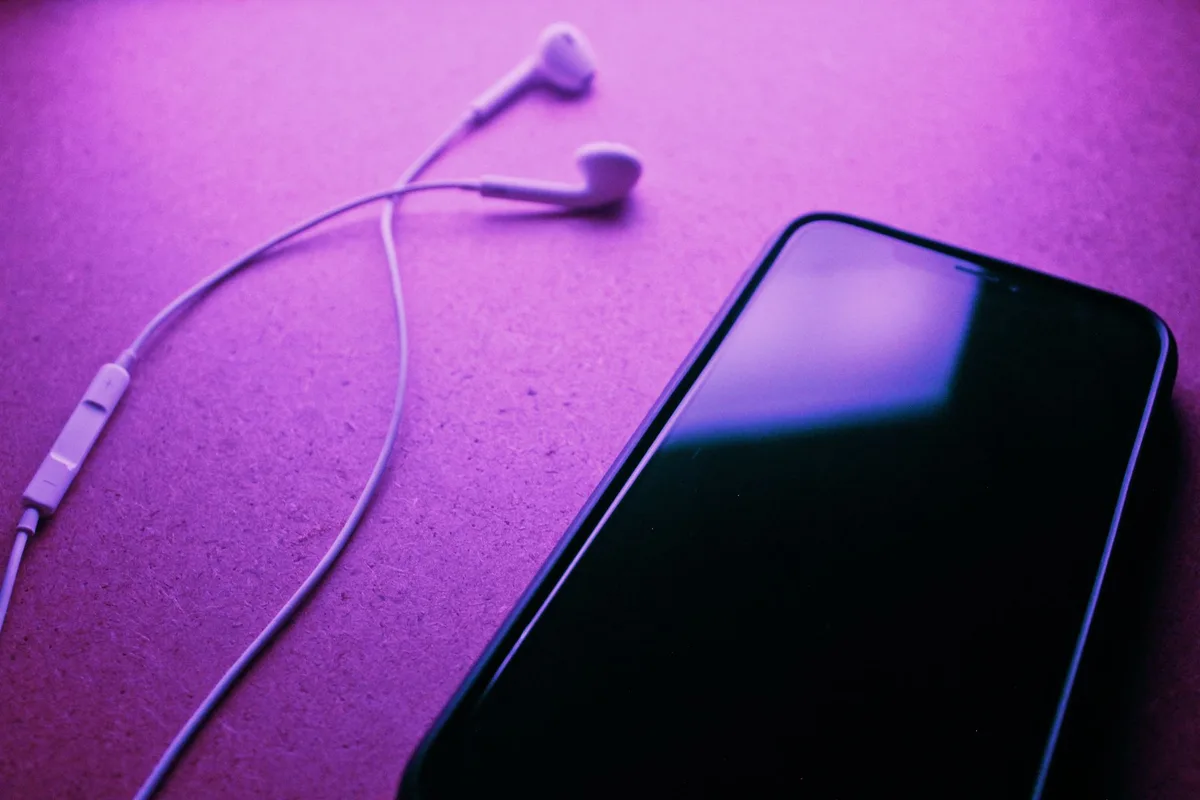 empty smartphone screen showing a music app with an unwanted album entry visible